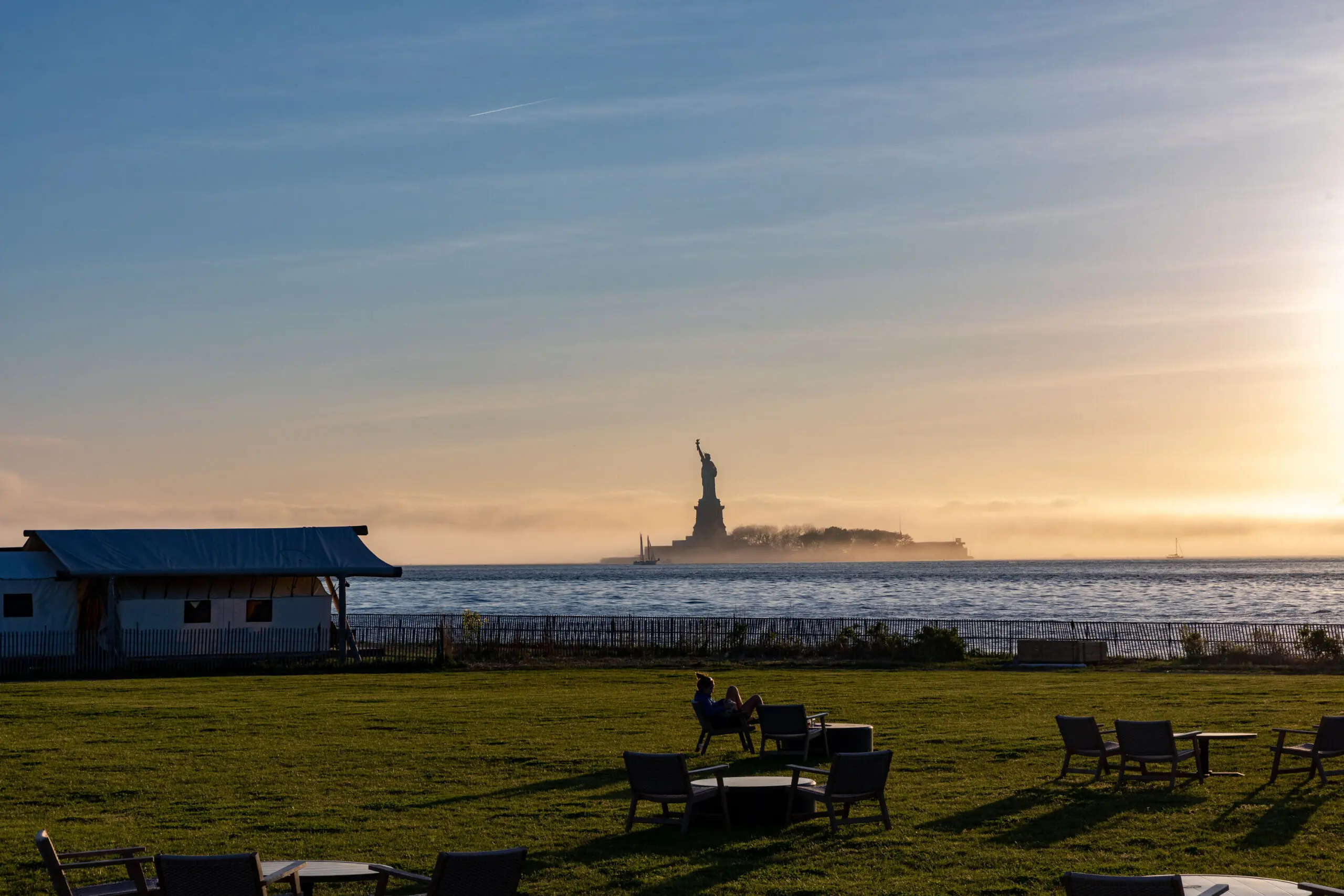 Private dining tent with views of the Statue of Liberty